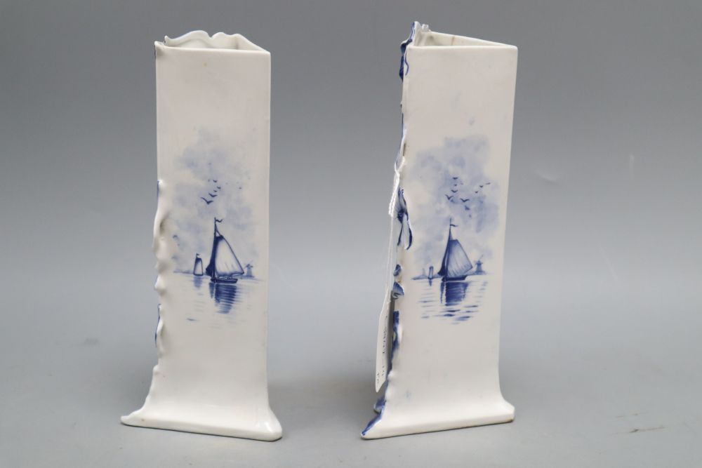 A pair of Delft Art Nouveau blue and white vases, height 21cm